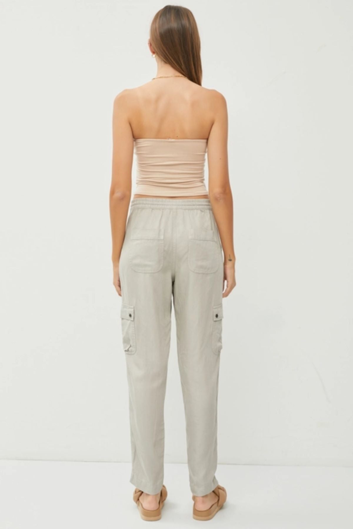 Image of a Basic light taupe Bandeau Top, model facing back