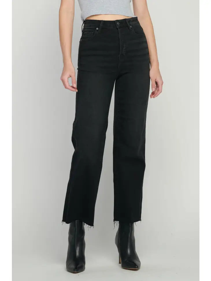 image of a black jean. Model facing to the front